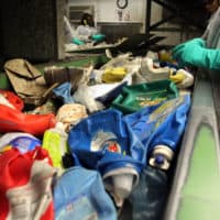 Recycling is sorted at the Sims Municipal Recycling Facility, an 11-acre recycling center on the Brooklyn waterfront on April 22, 2015 in New York City. (Spencer Platt/Getty Images)