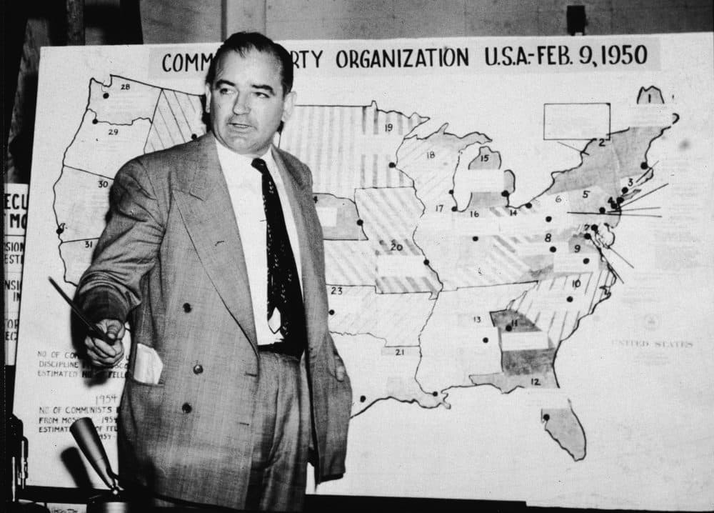American politician Joseph McCarthy, Republican senator from Wisconsin, testifies against the US Army during the Army-McCarthy hearings, Washington, DC, June 9, 1954. McCarthy stands before a map which charts Communist activity in the United States. (Getty Images)