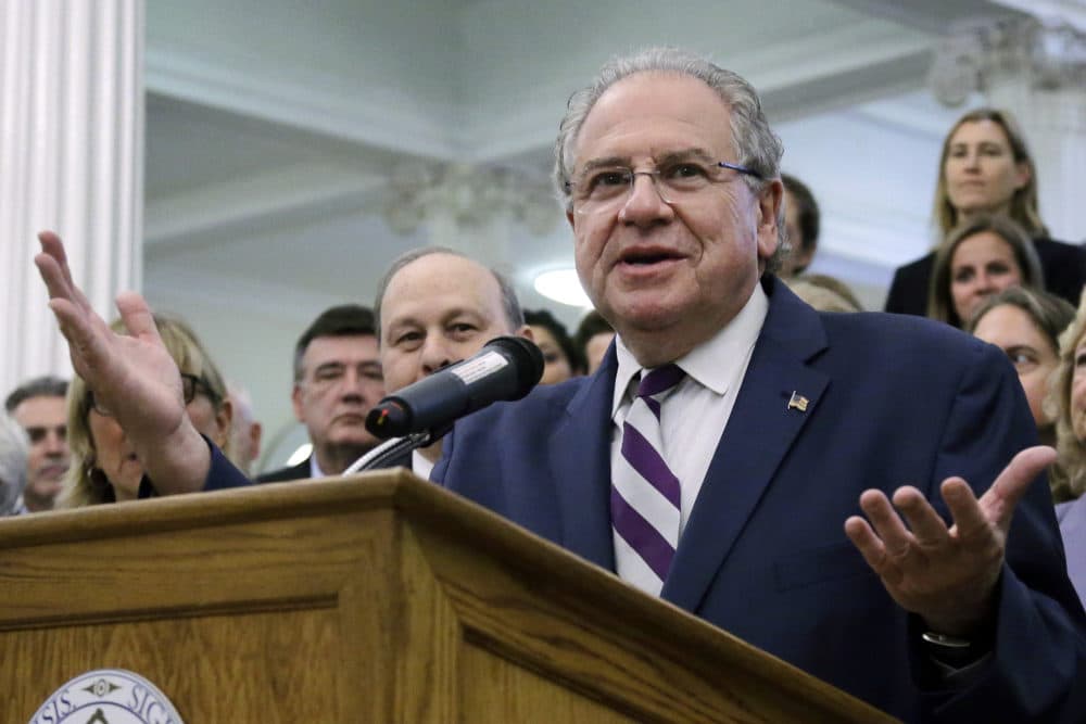 Massachusetts House Speaker Robert DeLeo speaks at a bill signing ceremony at the State House in Boston in 2016. (Elise Amendola/AP)