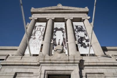 The Huntington Avenue entrance at the Museum of Fine Arts with banners featuring tribute drawings by Boston-based artist-in-residence Rob Stull featuring Lady Pink, Jean-Michel Basquiat and Futura. (Courtesy Museum of Fine Arts, Boston)