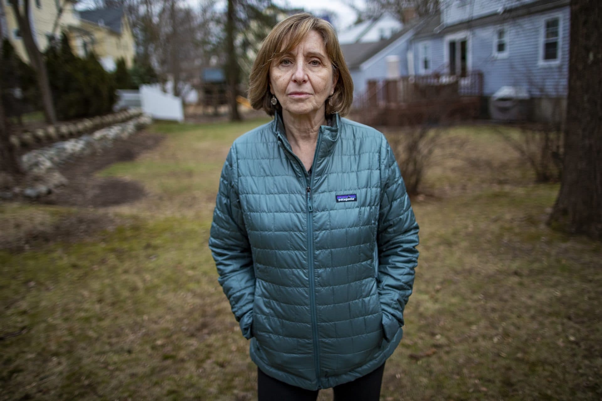 Claudia Lach lived through a time in Argentina where military coups and disappearances were common. She lost a dear friend whose family was taken and never heard from again. (Jesse Costa/WBUR)