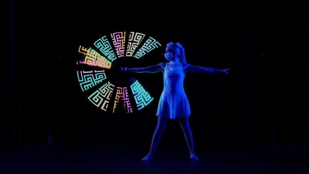 Boston Circus Guild member Liz Knights performing during "Keep the Light On." (Courtesy The Loop Lab)