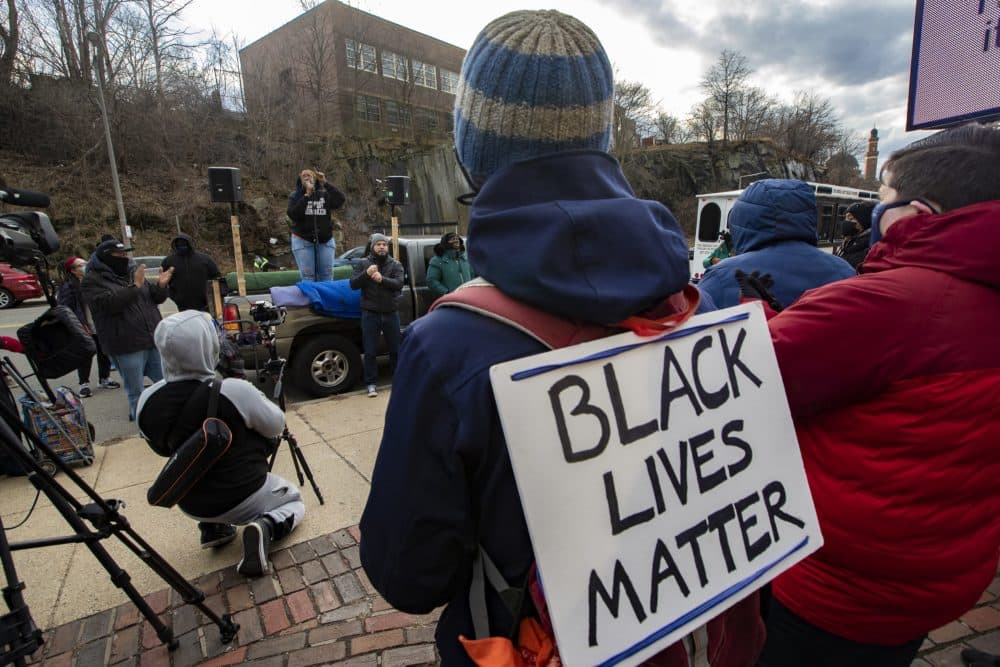Monica Cannon-Grant speaks at a Black Lives Matter rally at Madison Park High School on Martin Luther King Day. (Jesse Costa/WBUR)