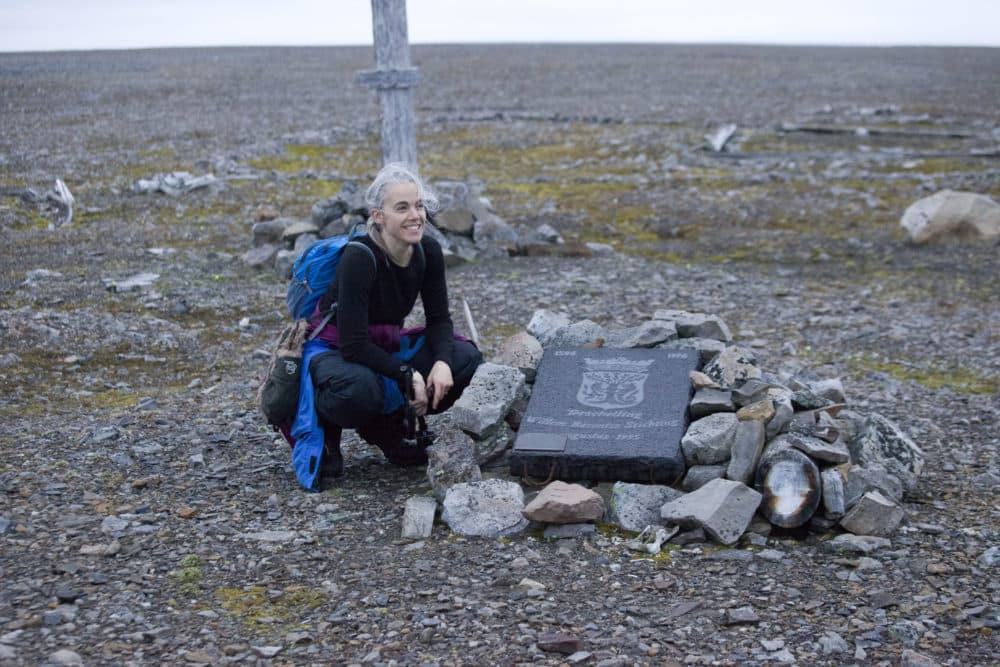 "Icebound" author Andrea Pitzer with memorial plaque on Nova Zembla (Novaya Zemlya) at the site of the ruins of William Barents' cabin. (Photo by Alexander Bogdanov)