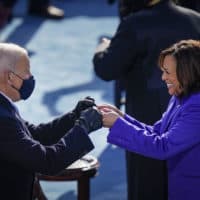 U.S. President-elect Joe Biden fist bumps newly sworn-in Vice President Kamala Harris after she took the oath of office on the West Front of the U.S. Capitol on January 20, 2021 in Washington, DC.  (Drew Angerer/Getty Images)