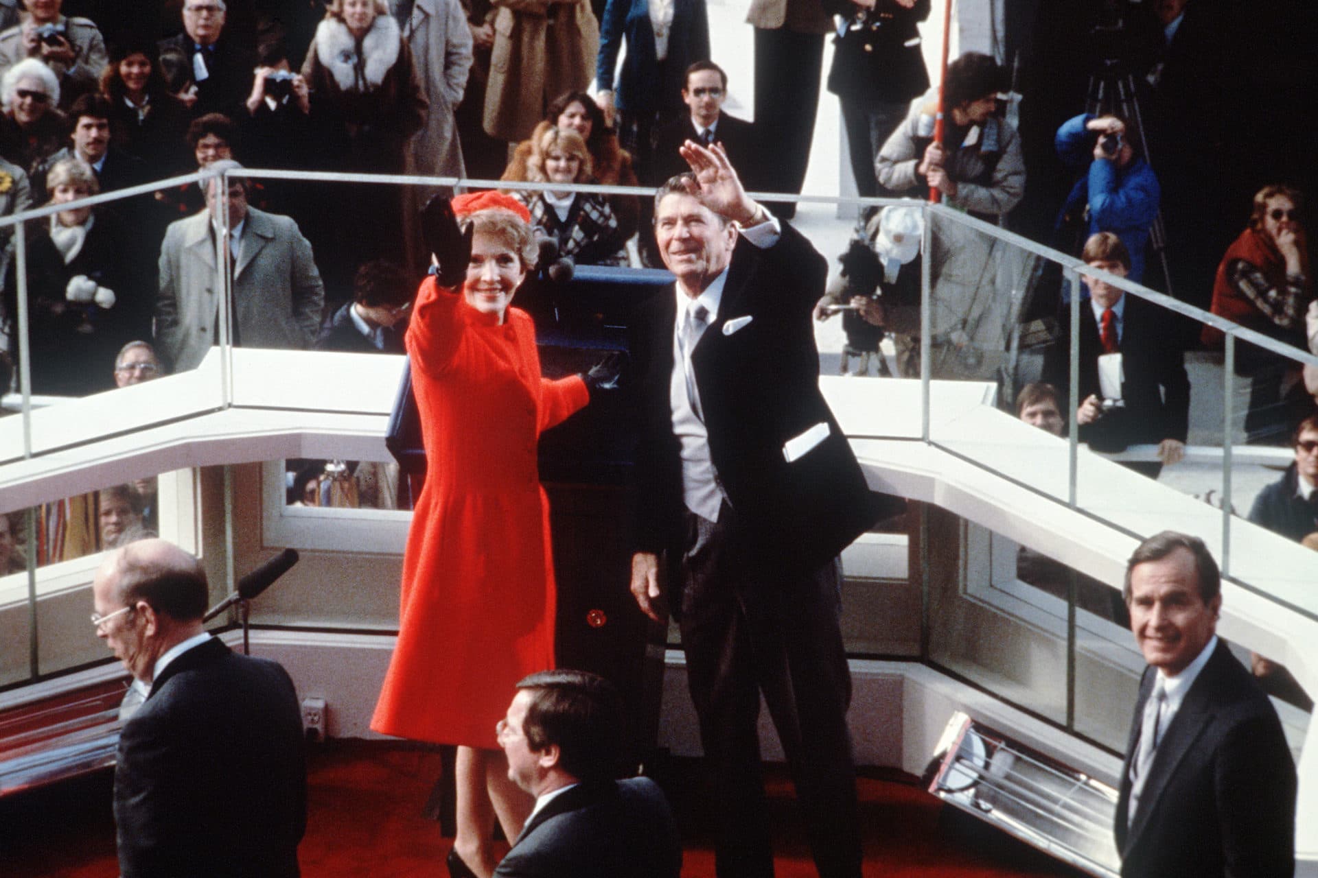 President Reagan salutes beside his wife Nancy Reagan after being sworn in as 40th President of the United States on January 20, 1981 at the Capitol in Washington, DC. At right is vice-president George W. Bush. (AFP via Getty Images)
