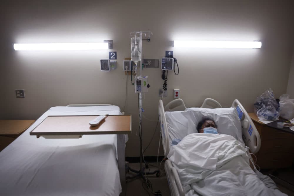 CHICAGO, ILLINOIS - DECEMBER 17: Joanne Childs Ferguson rests as she recovers from COVID-19 at Roseland Community Hospital on December 17, 2020 in Chicago, Illinois. Roseland Community Hospital is situated in the Roseland neighborhood on the city's far south side. The neighborhood's population is 95 percent black. The COVID-19 death rate among black residents in Chicago is nearly double that of the city’s white residents. (Photo by Scott Olson/Getty Images)