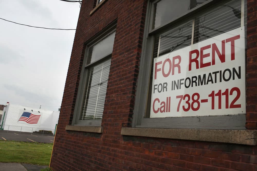 A "for rent" sign hangs in a window in Utica, New York. (Spencer Platt/Getty Images)