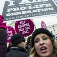 Pro-Life demonstrators try to block Pro-Choice supporters in front of the Supreme Court during the annual March for Life on the anniversary of the historic Roe v. Wade Supreme Court ruling in Washington, USA on January 27, 2017.
(Samuel Corum/Anadolu Agency/Getty Images)