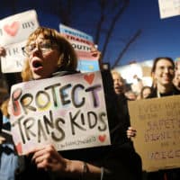 Protests in 2017 against a Trump administration announcement rescinding an Obama-era order allowing transgender students to use school bathrooms matching their gender identities, at the Stonewall Inn in New York City. (Spencer Platt/Getty Images)
