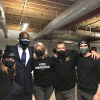 The author and his family with Rev. Raphael Warnock on election night at campaign headquarters in Atlanta. (Courtesy)