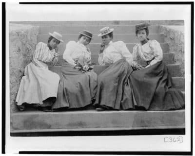 Four African American women seated on steps of building at Atlanta University, Georgia. This picture is part of W.E.B. Du Bois award-winning “Exhibit of American Negroes." (Courtesy of Library of Congress Prints and Photographs Division.)