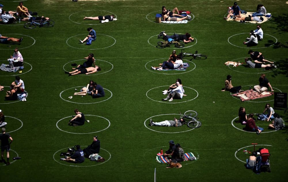 People are seen social distancing in Brooklyn. (Johannes Eisele/AFP via Getty Images)