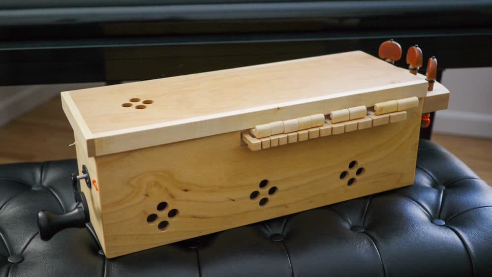 The hurdy-gurdy (a.k.a. symphonia) is a hand-cranked medieval string instrument. (courtesy Eric Shimelonis)