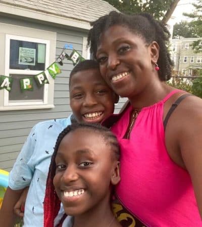 Shellina Semexant with her two kids, Joshua and Gina.