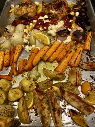 Sheet Pan Greek-Style Chicken, Lemon Potatoes, Carrots, Cherry Tomatoes And Onions With Feta Cheese. (Kathy Gunst)