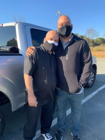 Tommy Rosa (left) with his son, Emmanuel, after Tommy was released from prison in 2020. (Courtesy / New England Innocence Project)