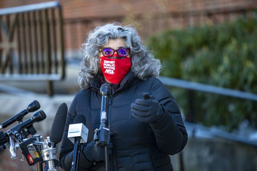 Massachusetts Teachers Association President Merrie Najimy speaks to the news media regarding Gov. Charlie Baker’s announcement related to vaccines for school employees, as well as the actions being taken by the Biden administration, at Watertown High School on Wednesday. (Jesse Costa/WBUR)