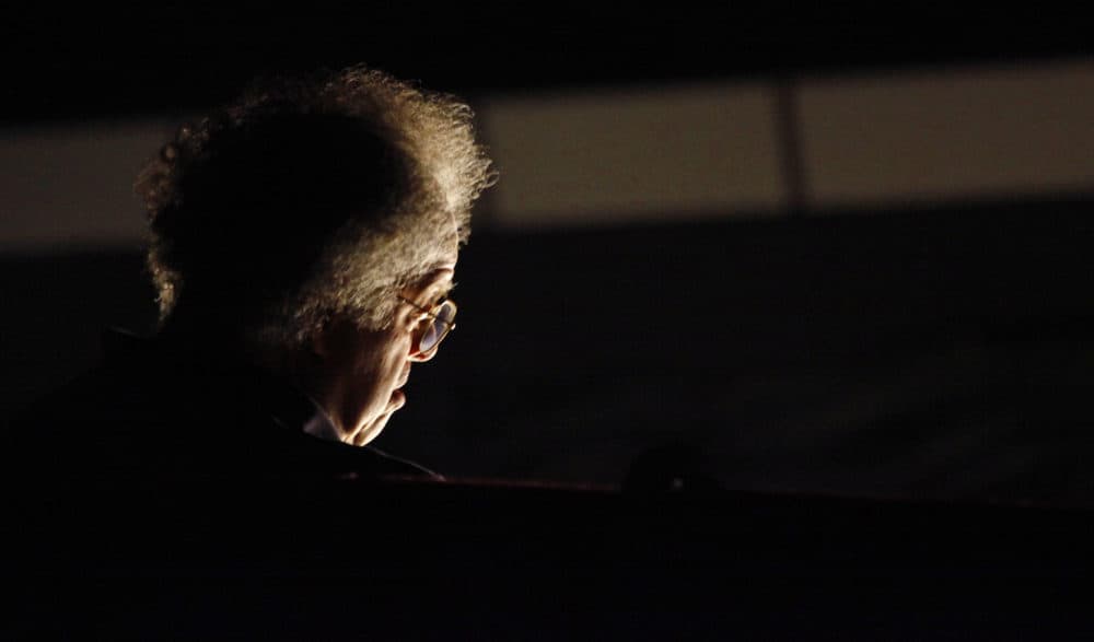 In this Sept. 23, 2010 photo, conductor James Levine is illuminated from the orchestra pit as he conducts during a dress rehearsal of New York Metropolitan Opera's "Das Rheingold" ("The Rhine Gold") in New York. (Craig Ruttle/AP)