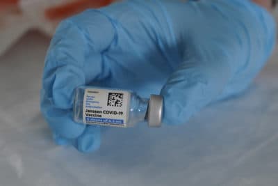 A vial containing five doses of the Johnson & Johnson COVID-19 vaccine. (Marta Lavandier/AP)