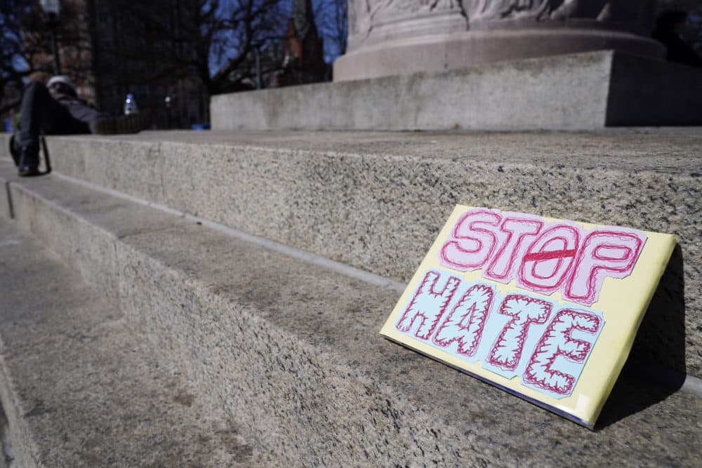 A sign seen in Chicago on March 20, 2021. A crowd gathered to demand justice for the victims of Atlanta, Georgia, spa shooting for an end to racism, xenophobia and misogyny. (Nam Y. Huh/AP)
