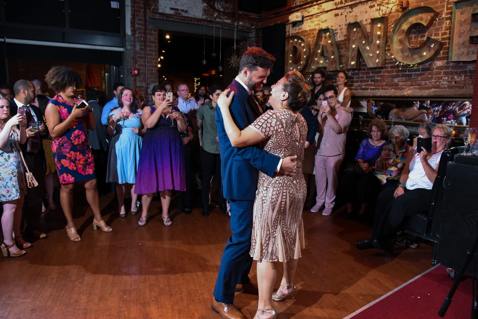 Margaret Willison, toward the left in the light blue dress, celebrates the wedding of her friends James Maher and Maggie Levine, who got married at Bella Luna. (Courtesy Willison)