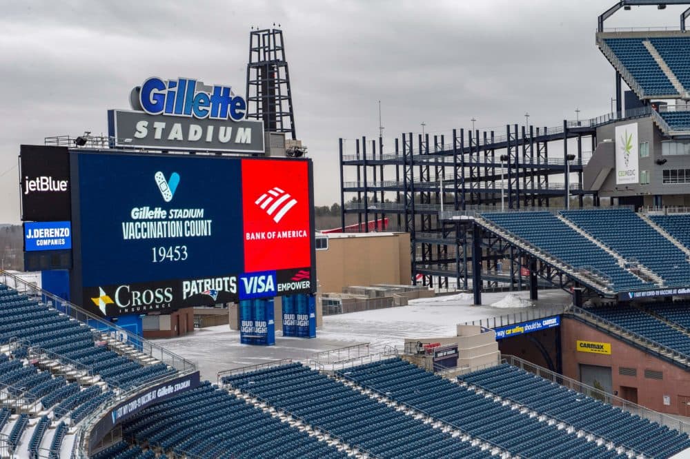 A megatron outside the stadium updates itself with the number of people that had been inoculated against COVID-19 at Gillette Stadium in Foxborough. (Joseph Prezioso/AFP via Getty Images)