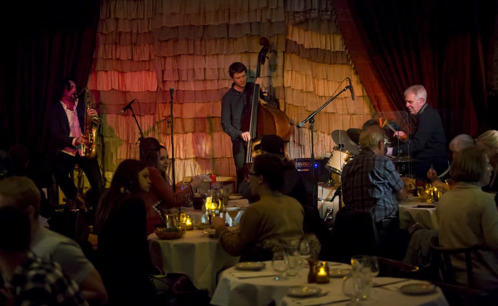 Singing is still restricted in Massachusetts clubs, limiting performers to groups without vocalists. The Beehive is resuming performances like this one, in 2017. (Jesse Costa/WBUR)