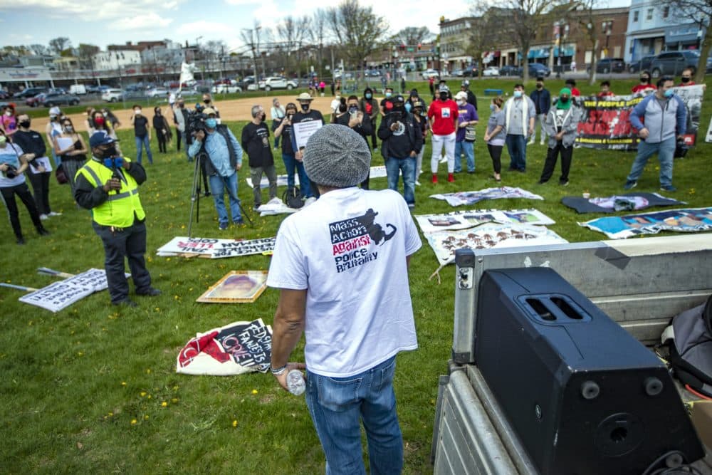 Brock Satter addresses about 100 protesters at the Mass. Action Against Police Brutality rally and march in Fields Corner. (Jesse Costa/WBUR)