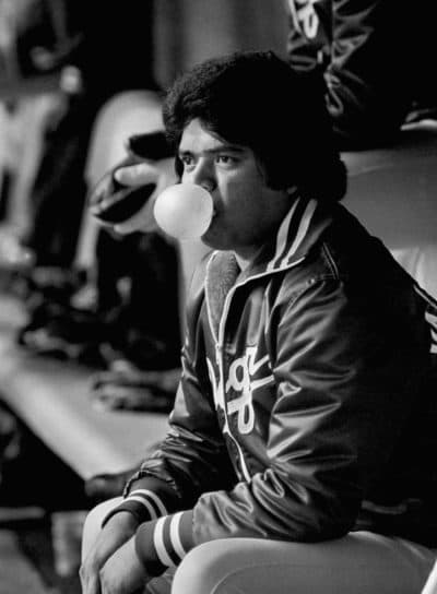 Los Angeles Dodgers pitcher Fernando Valenzuela blows bubbles as he passes the time in the dugout during the rain delay before Game 3 of the National League playoffs with the Expos at Montreal, Oct. 18, 1981. (Rusty Kennedy/AP)