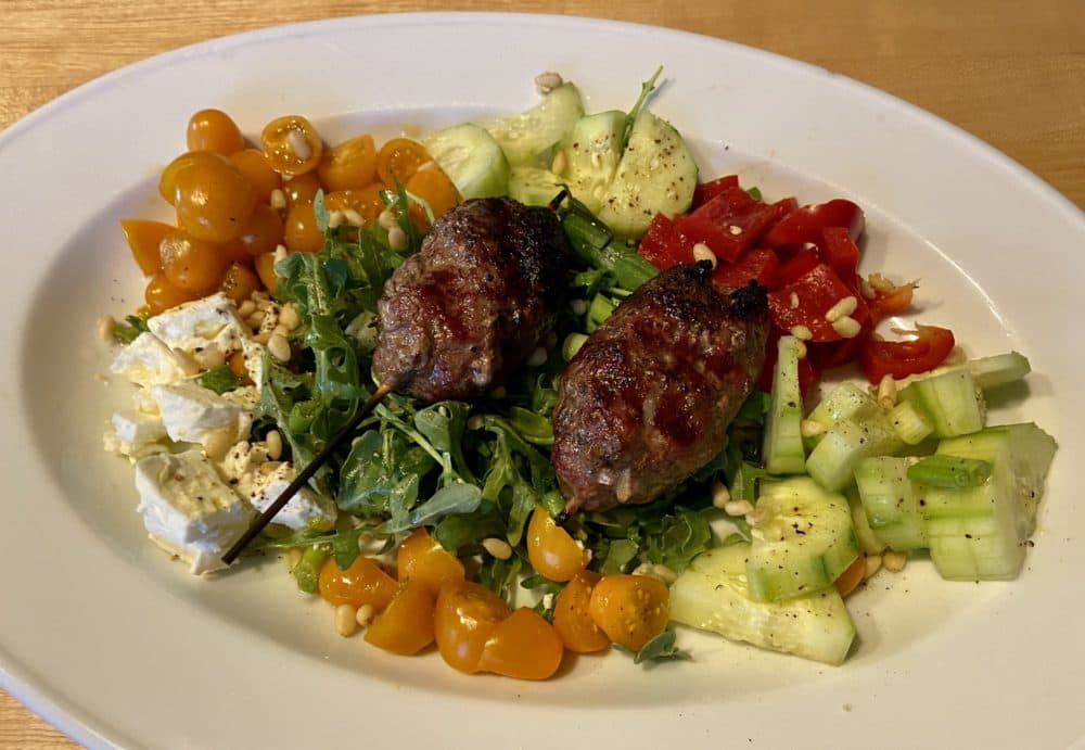 Lamb köfte with Greek-style spring salad. (Kathy Gunst)