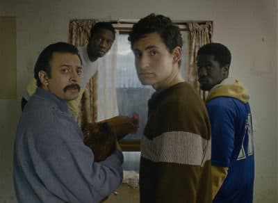 Left to right: Vikash Bhai as Farhad, Kwabena Ansah as Abedi, Amir El-Masry as Omar and Ola Orebiyi as Wasef in "Limbo." (Courtesy Focus Features)