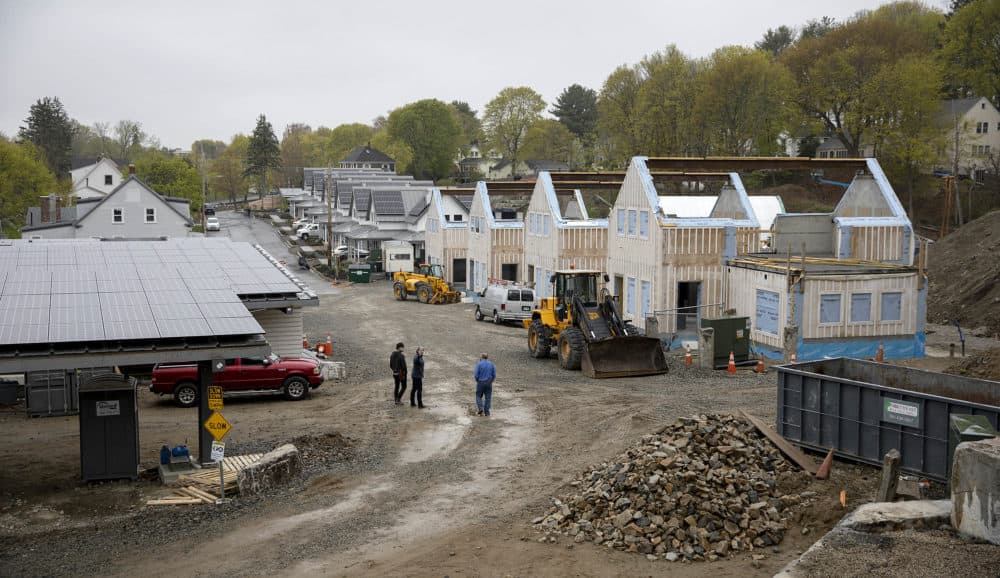 Passive house buildings under construction at the Hillside Center for Sustainable Living in Newburyport, Mass. (Robin Lubbock/WBUR)