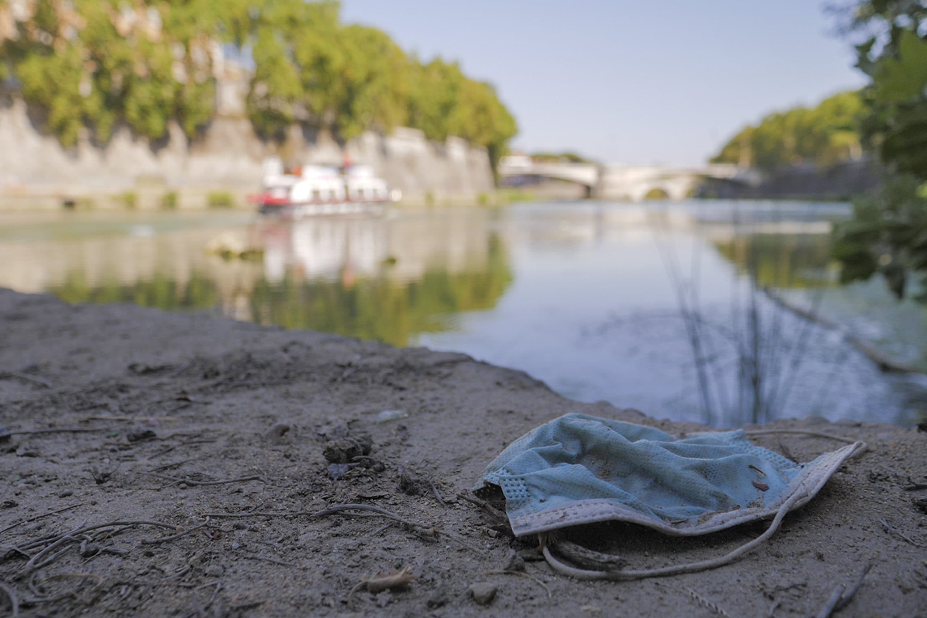A face mask thrown on the ground. (Paolo Santalucia/AP)