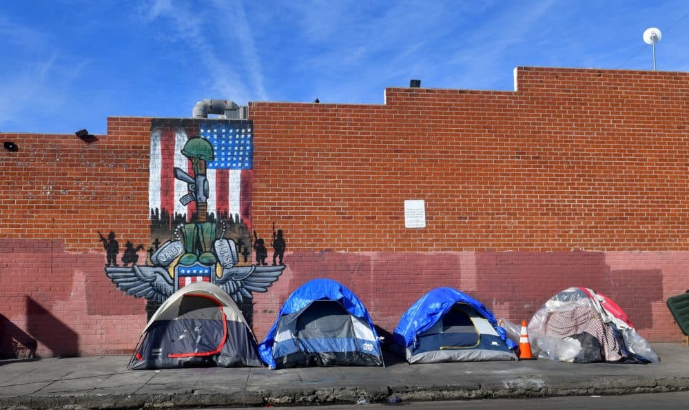 Tents for the homeless line a sidewalk in Los Angeles, California on December 17, 2019. (Frederic J. Brown/AFP via Getty Images)