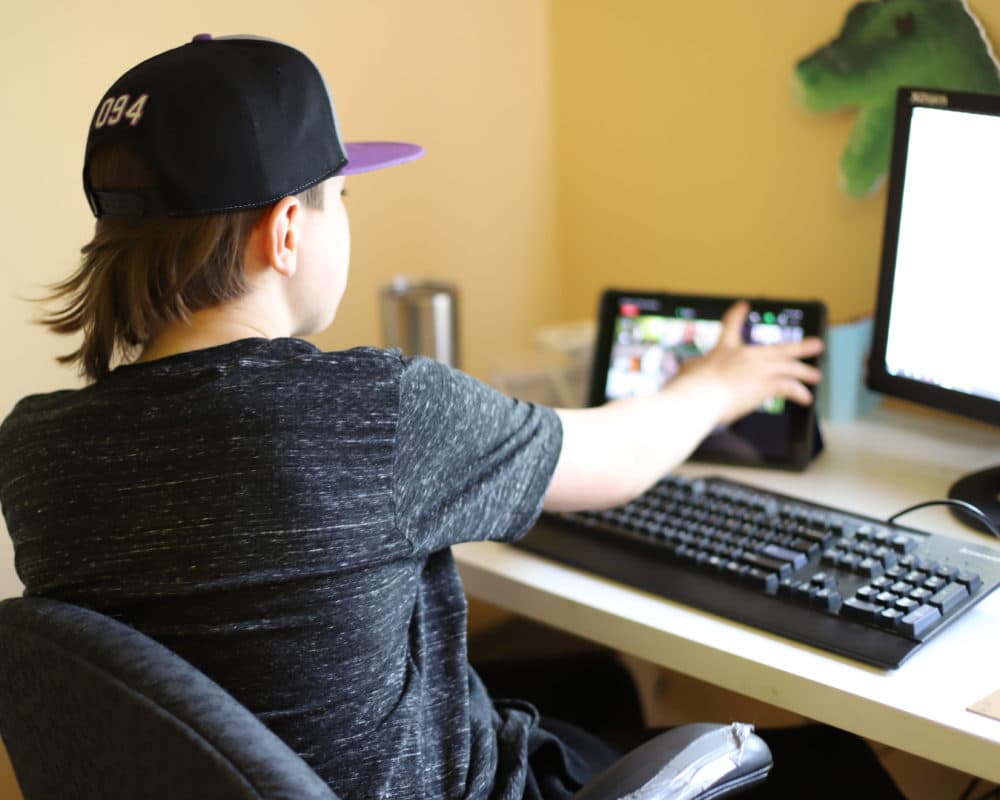 Harrison often joins his remote classes on his iPad. (Courtesy Jen Manell)