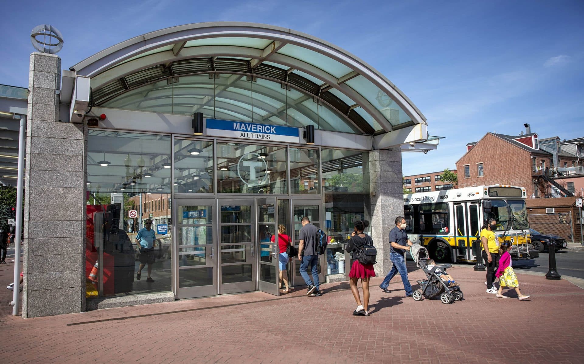 Commuters walk into Maverick station in East Boston. (Robin Lubbock/WBUR)