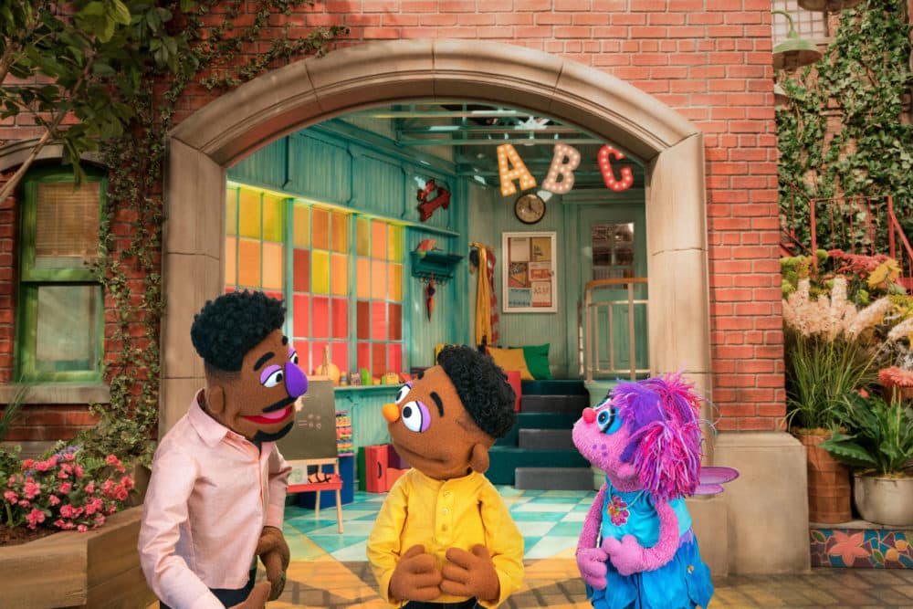 Wesley Walker (center) and his father Elijah (left) (Richard Termine/Sesame Workshop)