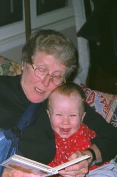 The author's mother reading to her grandson. (Courtesy)