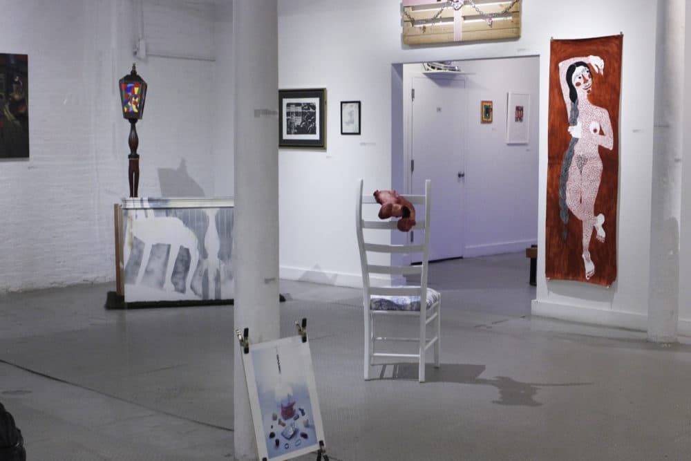“some assembly required” on view now at the Distillery Gallery features 34 works from 30 artists. (Jenn Stanley for WBUR)