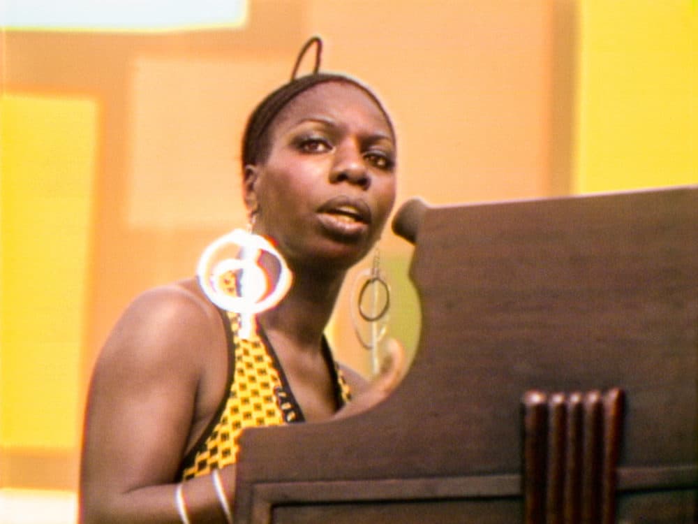 Nina Simone performs at the Harlem Cultural Festival in 1969. (Photo courtesy of Searchlight Pictures. © 2021 20th Century Studios)