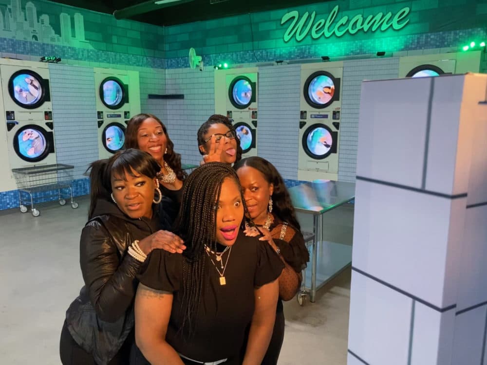 Visitors pose in the Vibe-O-Mat room at "Go Pixel Yourself." (Courtesy John Carter)