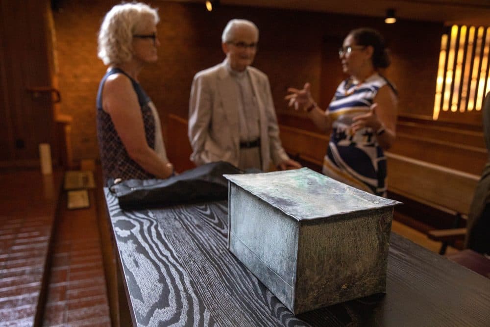 Workers found the box beneath the cornerstone of a 19th century church in the South End. (Robin Lubbock/WBUR)
