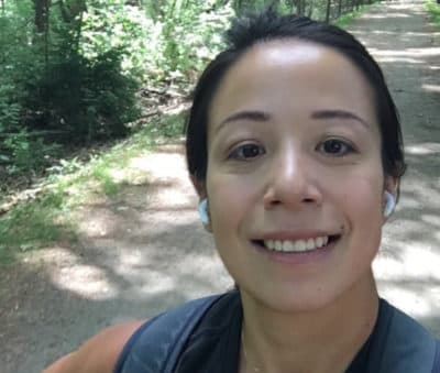 The author, pictured 12 miles into her walk to Walden Pond. (Courtesy Aube Rey Lescure)