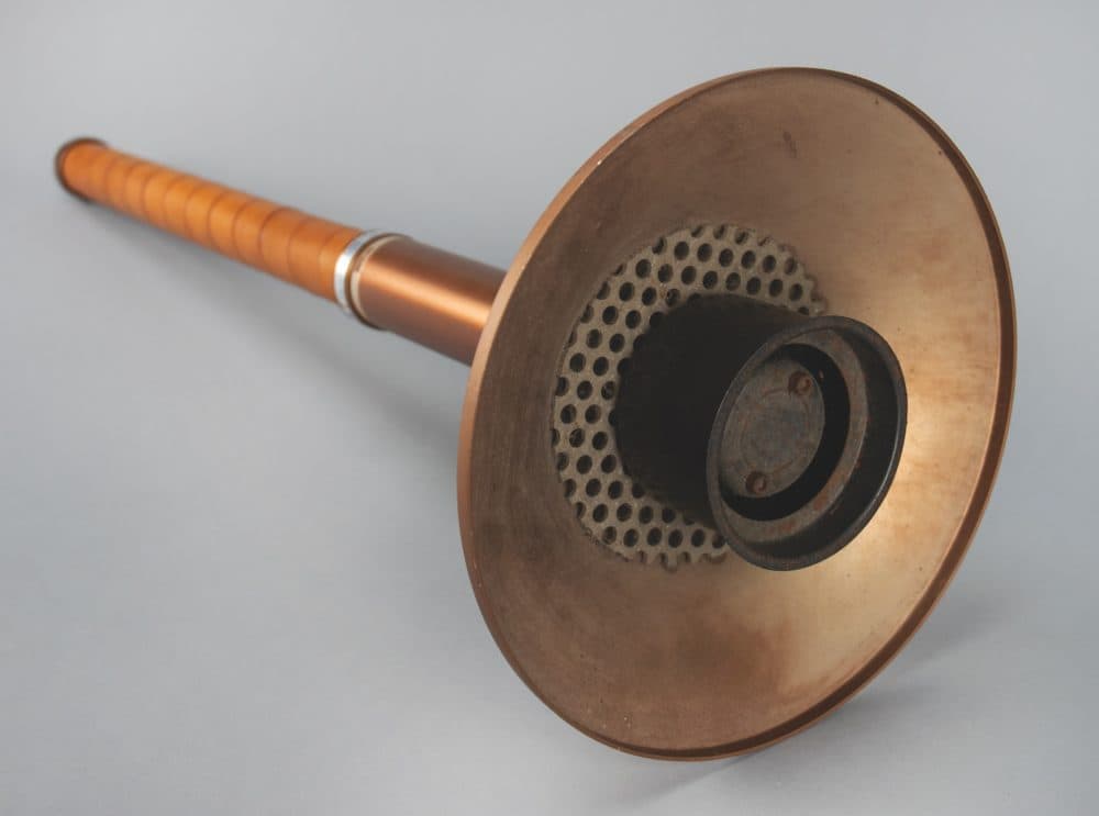 The appreciably rare 1980 Lake Placid Olympics torch, comprised of bronze-colored leather and metal, designed by Don McFarland and manufactured by Cleanweld Turner. The torch design and materials symbolized a blend of modern technology and a reference to Ancient Greece. (Courtesy RR Auction)