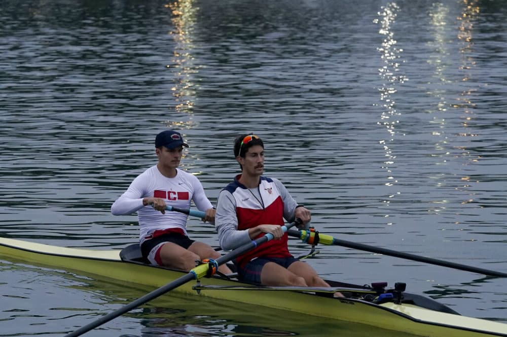 Austin Hack, right, practices in the Oakland Estuary in California in 2020. (Jeff Chiu/AP)
