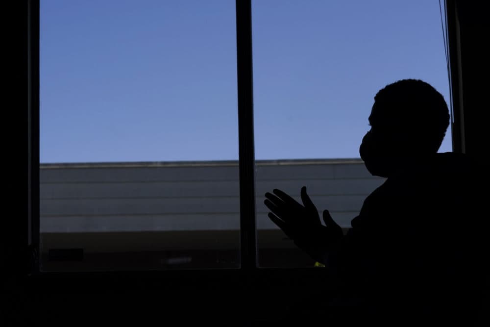 "D.Y.," a teenager who is living in a foster-care group home, takes part in an AP interview on May 21, 2021, in the facility's administrative office in Washing. D.Y., who is not being named by the AP to protect his identity, is currently suing the Washington state Department of Children, Youth and Families, alleging that the state has provided inadequate care after bouncing him through more than 50 placements before the COVID-19 pandemic. (Ted S. Warren/AP)