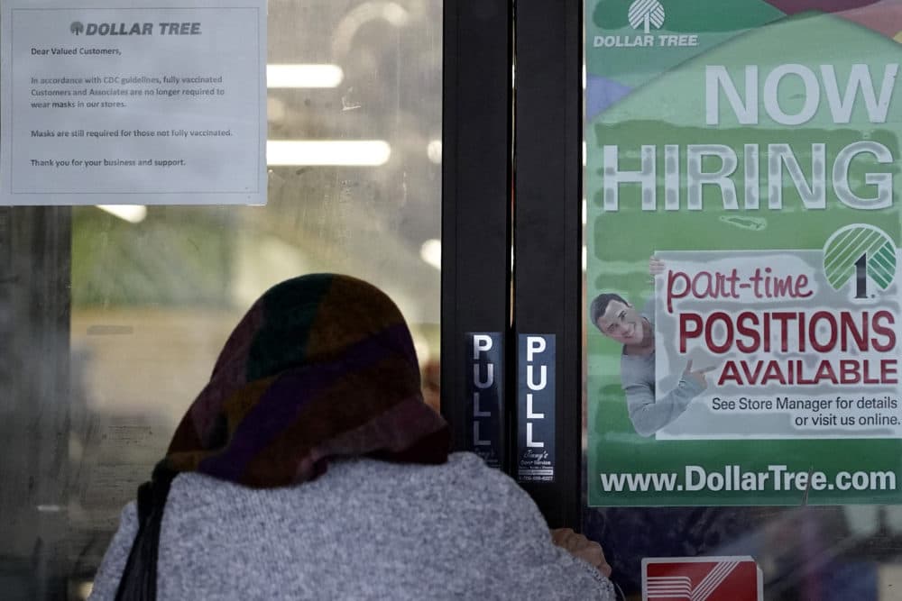 A shopper enters a retail store as a hiring sign shows in Buffalo Grove, Ill., June 24, 2021. (Nam Y. Huh/AP)