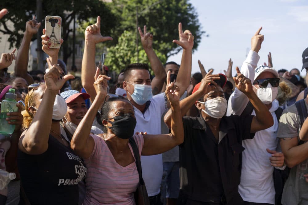 Anti-government protesters march in Havana, Cuba. (Eliana Aponte/AP Photo)