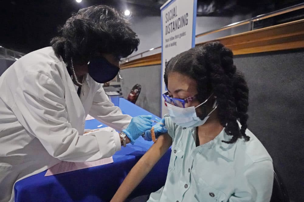 Nurse Maggie Bass gives Ayana Campbell, 14, a dose of the Pfizer vaccine at an open COVID-19 vaccination site in Jackson, Miss., Tuesday, July 27, 2021. (Rogelio V. Solis/AP)